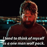 a man with a beard is talking about himself as a one man wolf pack .