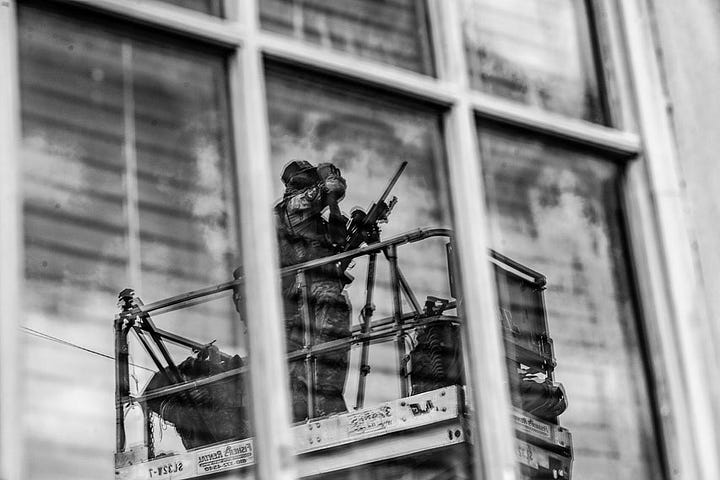 A collage of sniper photos as Republican Vice President candidate Senator JD Vance campaigning in Leesburg, Pennsylvania. Mark Peterson/Redux for The New Yorker.