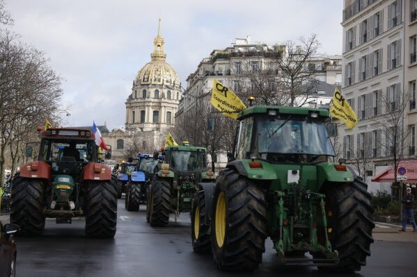 Angry French farmers with tractors are back on the streets of Paris for  another protest | AP News