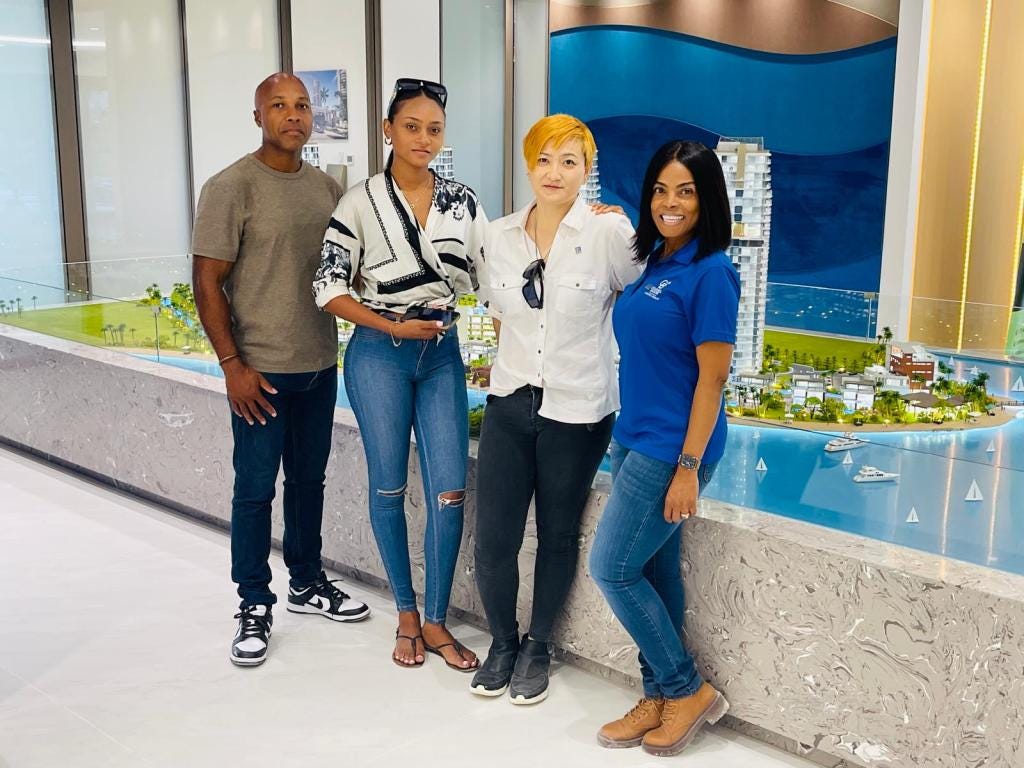 Meet the Team Behind The Pinnacle Open House! From left to right in our main shot: Dean Jones, Anita Baker, Minjun Zeng, and Keesha Answer, alongside our dedicated staff member at The Pinnacle. Our Co-op Anchor team is here to guide you through every detail of Montego Bay’s premier waterfront development.