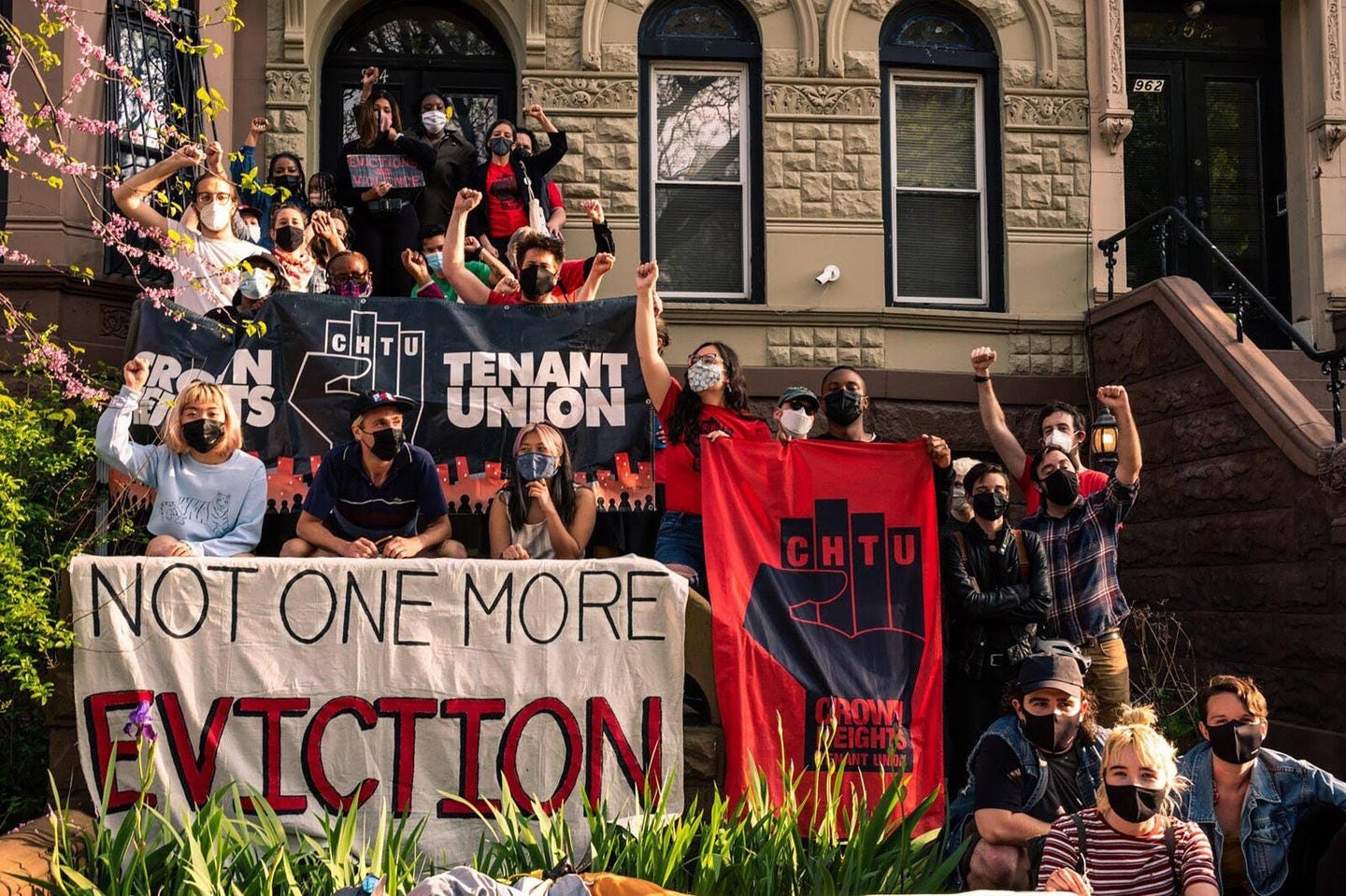 Tenant organizers outside a building