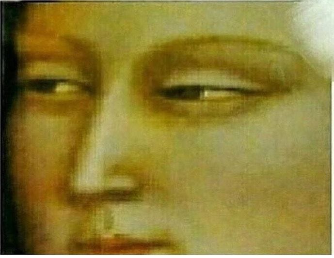 This may contain: a close up photo of a woman's face and eyes in blurry light This may contain: a close up photo of a woman's face and eyes in blurry light