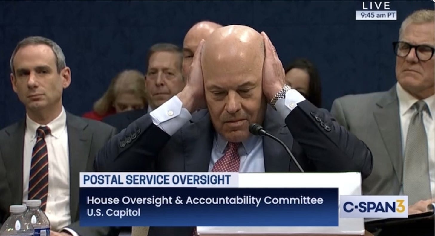 Postmaster General Covers Ears in Protest During Wild Exchange With House  Republican: 'You're Talking To Yourself'