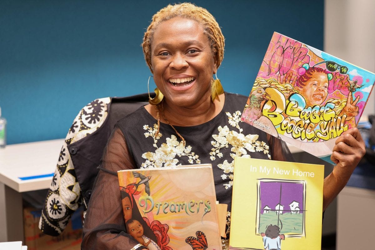 Amina Humphrey, El Camino College ethnic studies professor, shows books in her office on Tuesday, April 8. Her curated micro-library focuses on the authentically-told stories of marginalized communities. (Melissa Palmer | The Union)