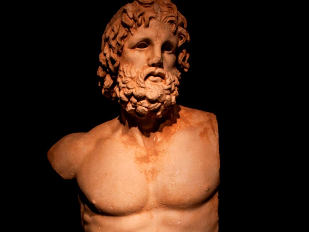A statue of a man with a beard and a beard A statue of a man with a beard and a beard