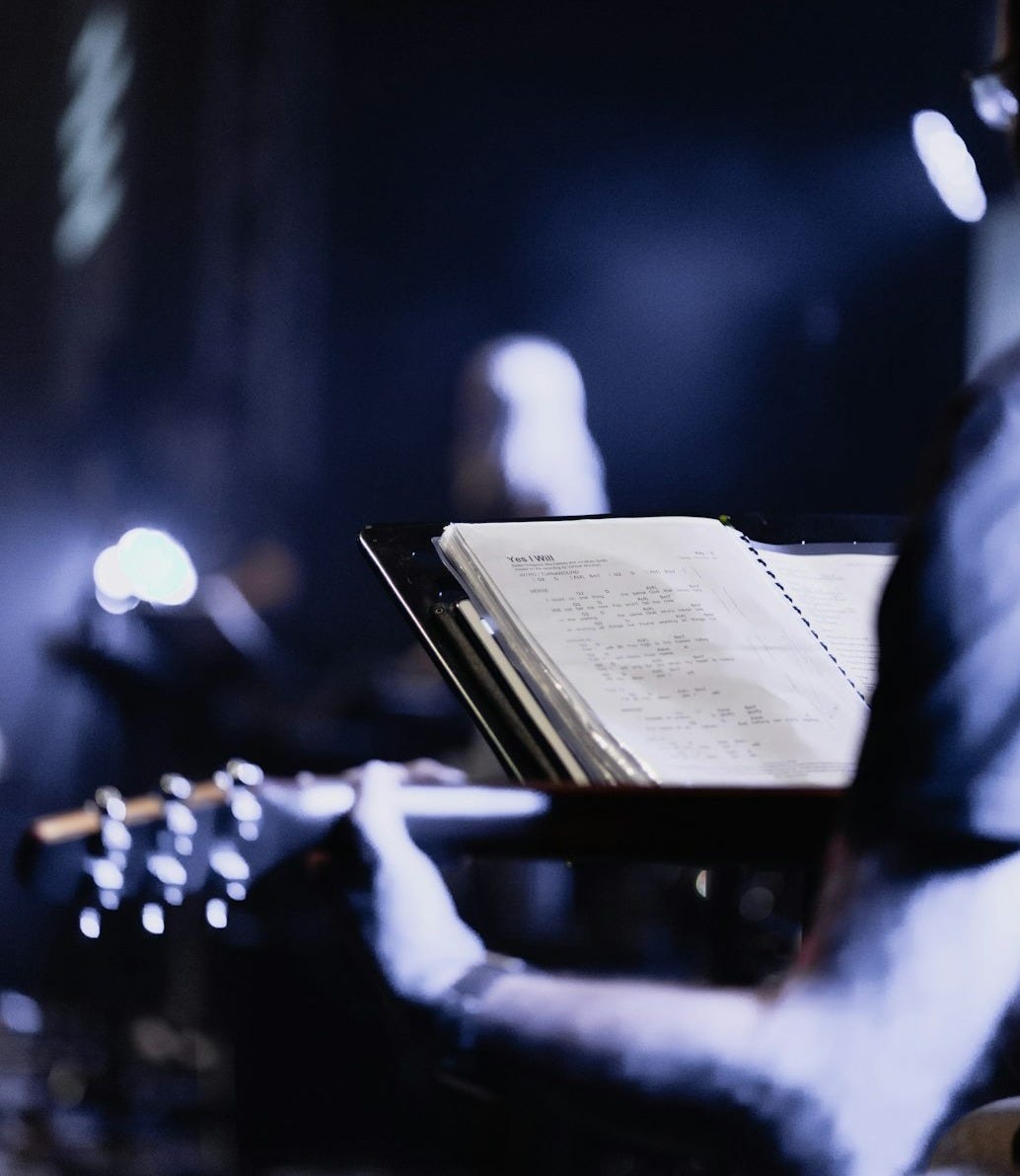 person holding guitar