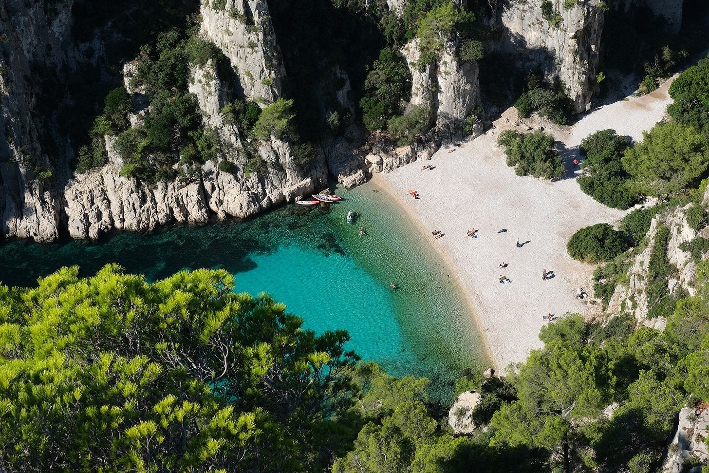 The turquoise cove and beach of Calanque d'En-Vau from above The turquoise cove and beach of Calanque d'En-Vau from above