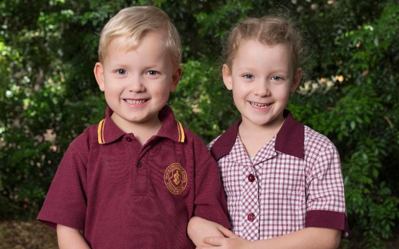 twins in separate classes at school