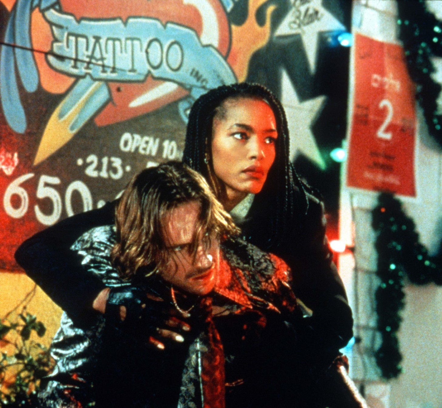 Ralph Fiennes and Angela Bassett in "Strange Days" (1995)