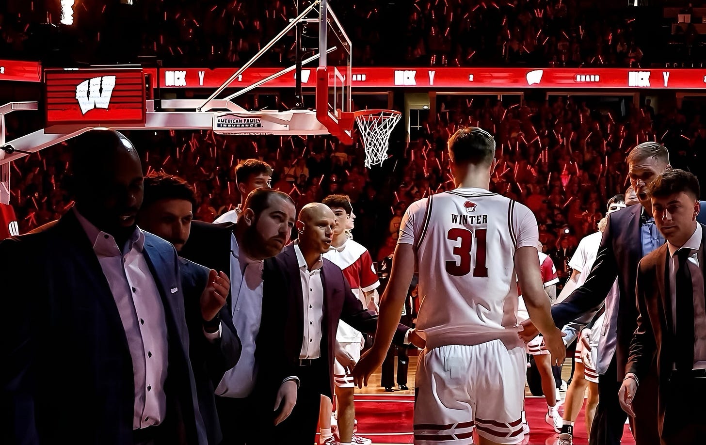 Wisconsin Badgers forward Nolan Winter walks out during starting lineups at the Kohl Center.