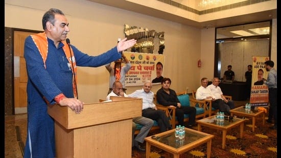 BJP candidate Sanjay Tandon addressing a gathering during his poll campaign in Chandigarh. (HT photo)