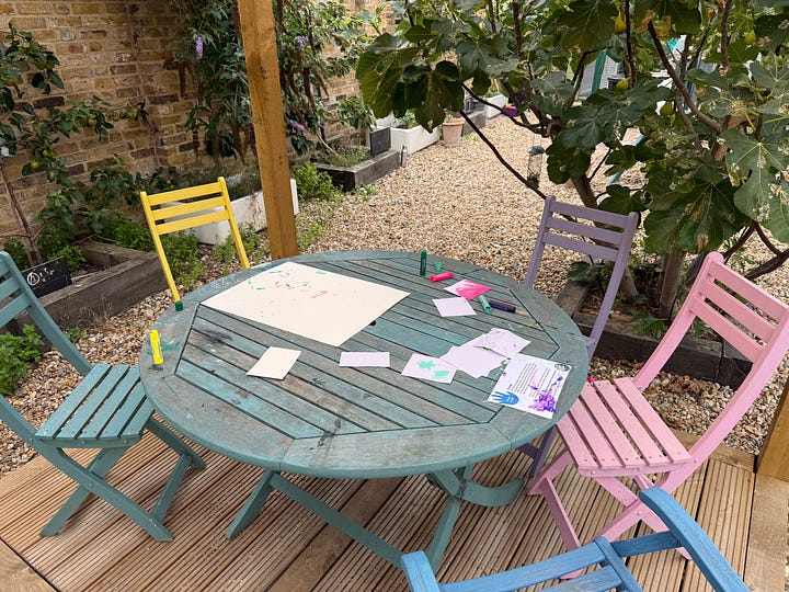 Creative prompts scattered around the garden, alongside nature-inspired artwork