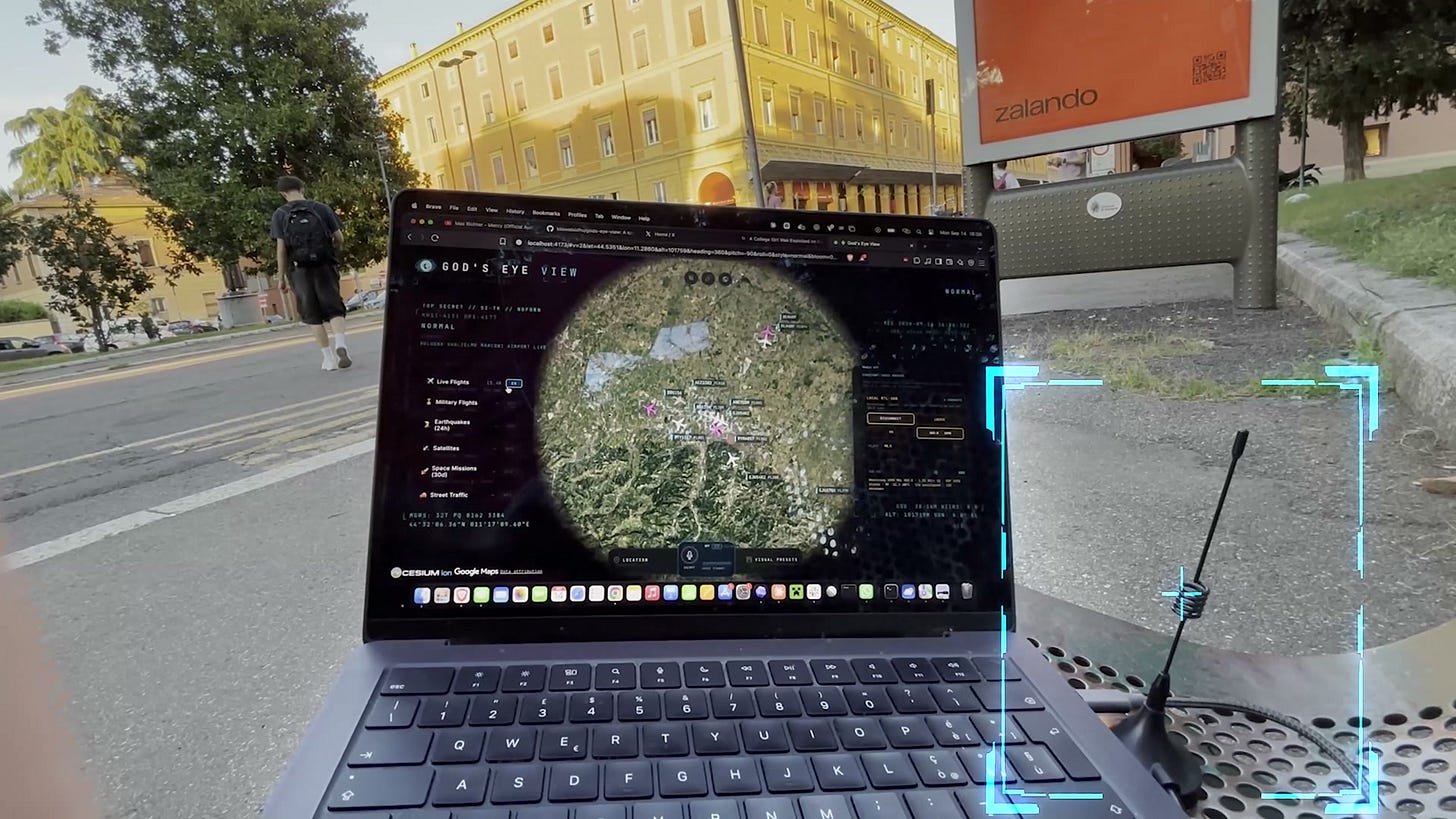 A laptop running God’s Eye View on an outdoor table beside a radio receiver and antenna equipment. A laptop running God’s Eye View on an outdoor table beside a radio receiver and antenna equipment.