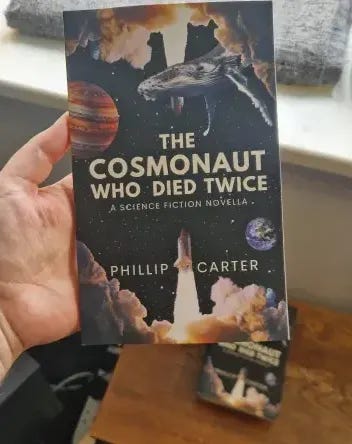 Image of the book THE COSMONAUT WHO DIED TWICE - the cover depicts a space shuttle meeting itself in space, with Jupiter and Earth in the background, alongside a whale Image of the book THE COSMONAUT WHO DIED TWICE - the cover depicts a space shuttle meeting itself in space, with Jupiter and Earth in the background, alongside a whale
