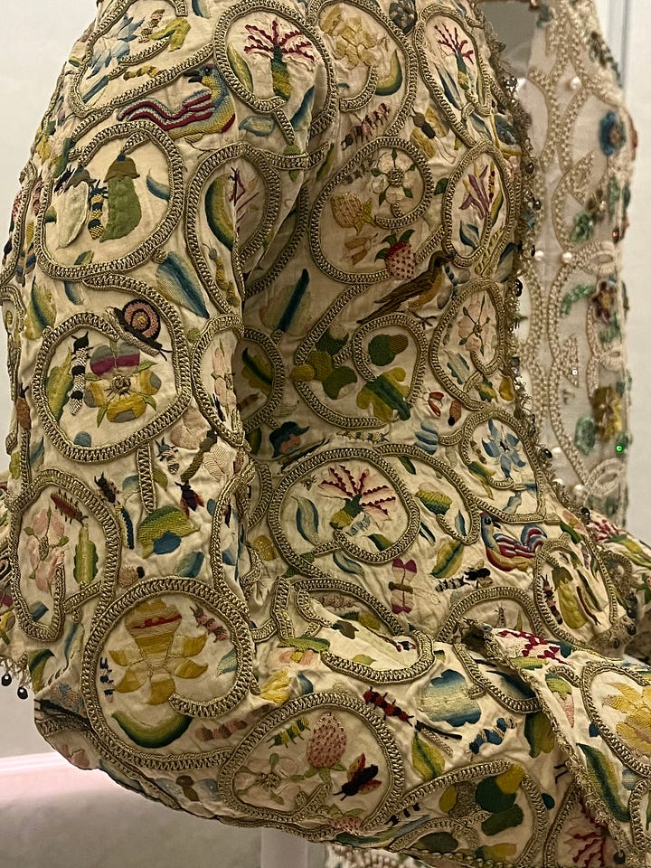 Garments from the Sleeping Beauties show at the Met all featuring some bug-related inspiration.