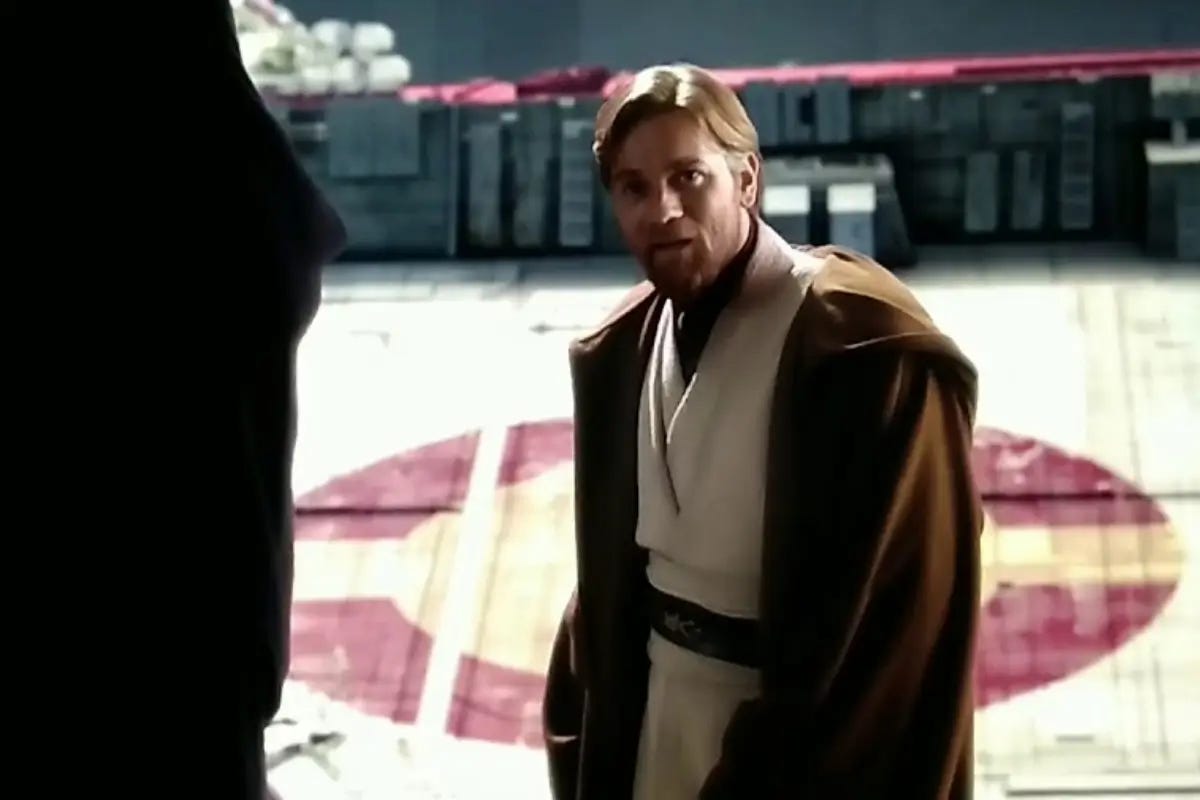 Obi-Wan Kenobi, standing in the light and in his lighter robes, bids Anakin Skywalker farewell in 'Revenge of the Sith.' Obi-Wan Kenobi, standing in the light and in his lighter robes, bids Anakin Skywalker farewell in 'Revenge of the Sith.'