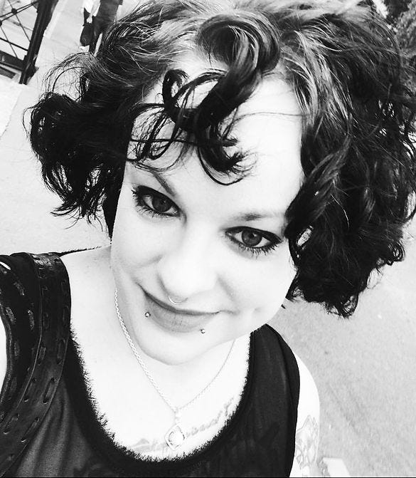 Black and white image of the author, Liana Kapelke-Dale.