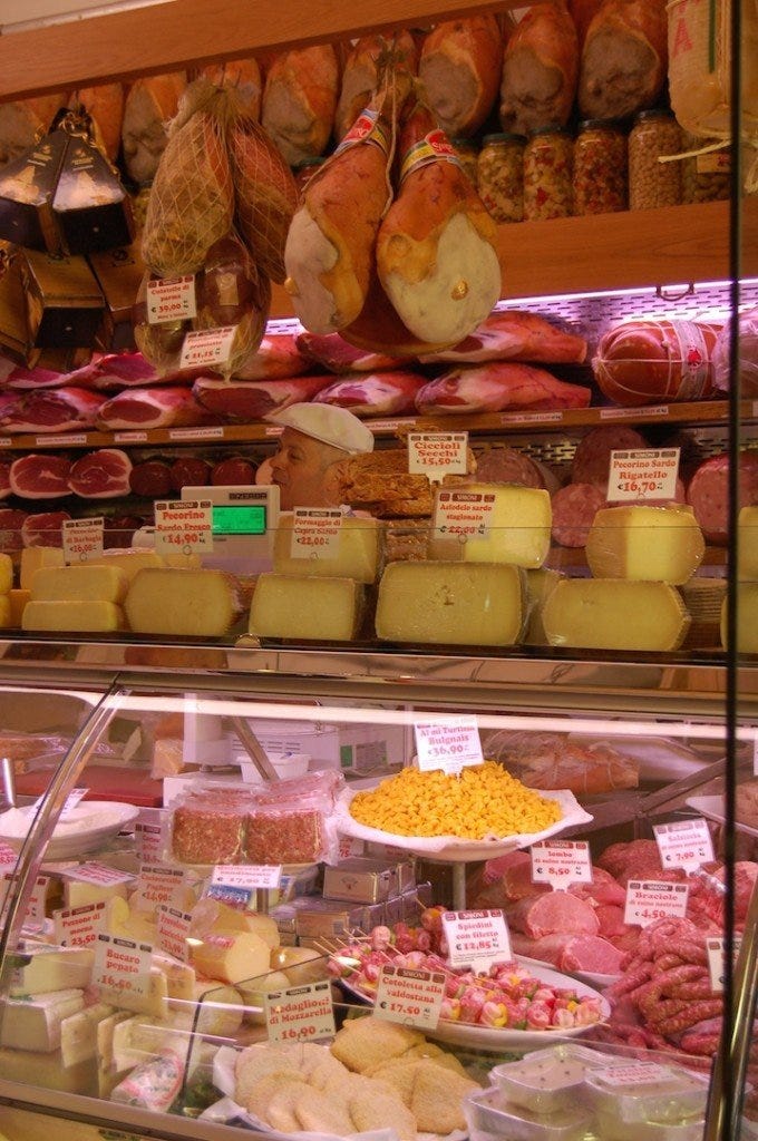 Italian cheeses, mortadella and more in the amazing delicatessens of the town