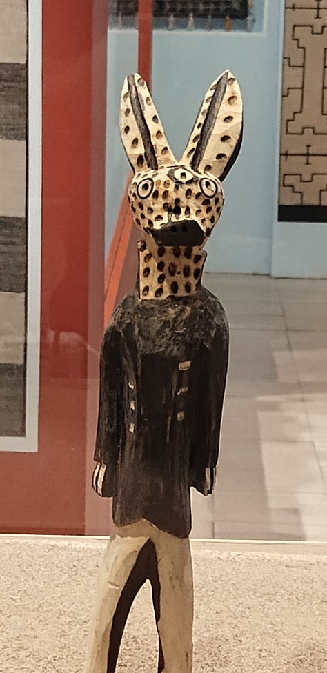 outdoor sculpture and photos of figurines from many peoples