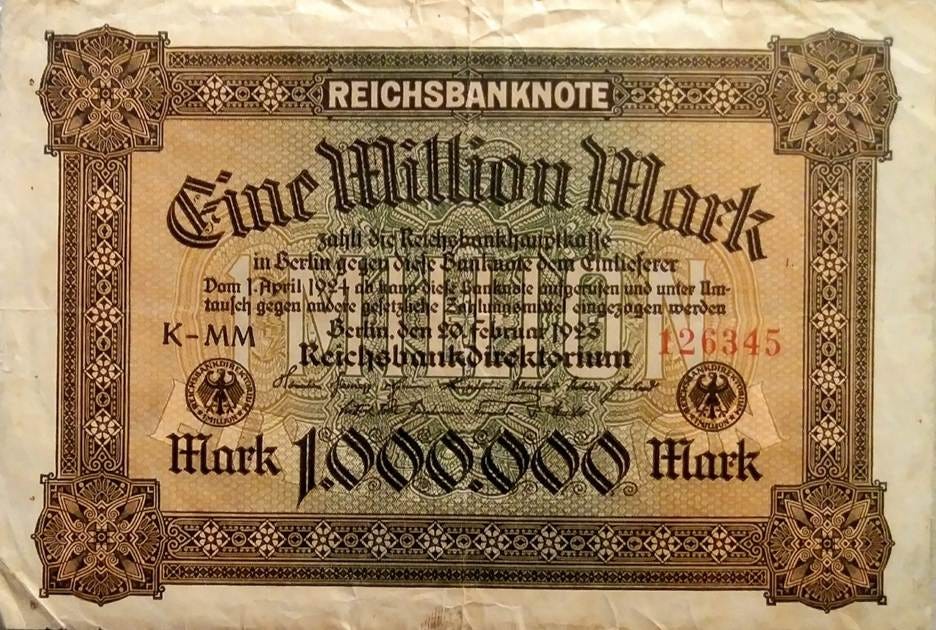 A close-up of a money note

AI-generated content may be incorrect.
