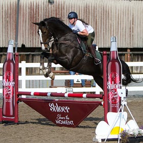 Sun shines on Shloer show jumping