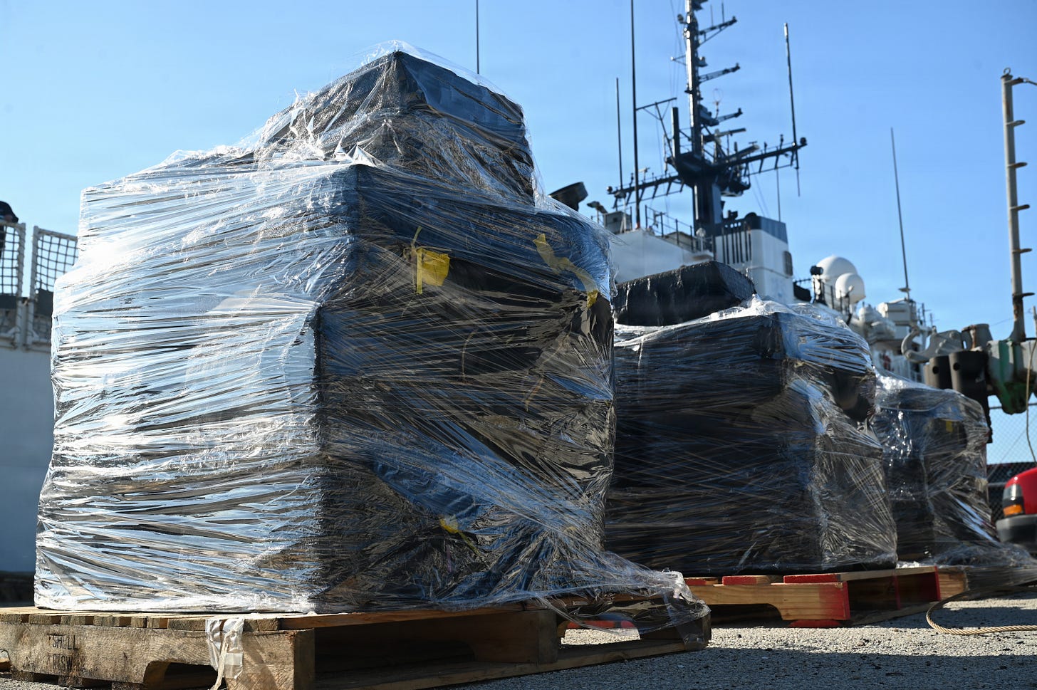 The US Coast Guard Cutter Escanaba offloads 7,050 pounds of cocaine worth more than $53 million at Port Everglades, Florida (US Coast Guard photo)