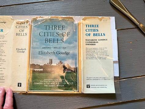 Steps 1-9 described below for how to wrap the Three Cities of Bells dust jacket in a mylar cover