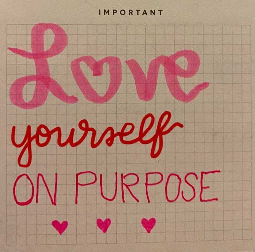 Love Yourself on Purpose calligraphed in pink and red ink