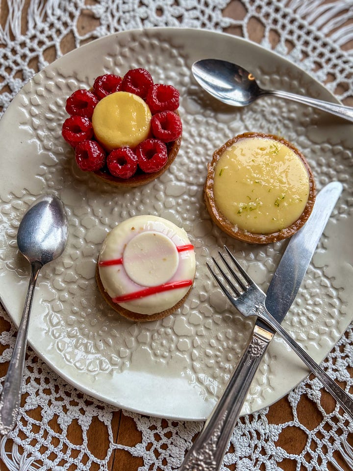 Colorful fruit pastries are served on a holiday party dessert table