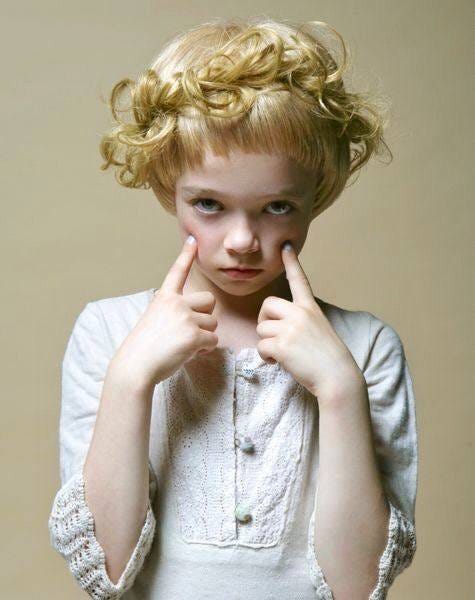 May be an image of blonde hair and child