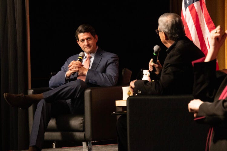 Paul Ryan listening to a question being asked by UWM Charlie Sykes Paul Ryan listening to a question being asked by UWM Charlie Sykes
