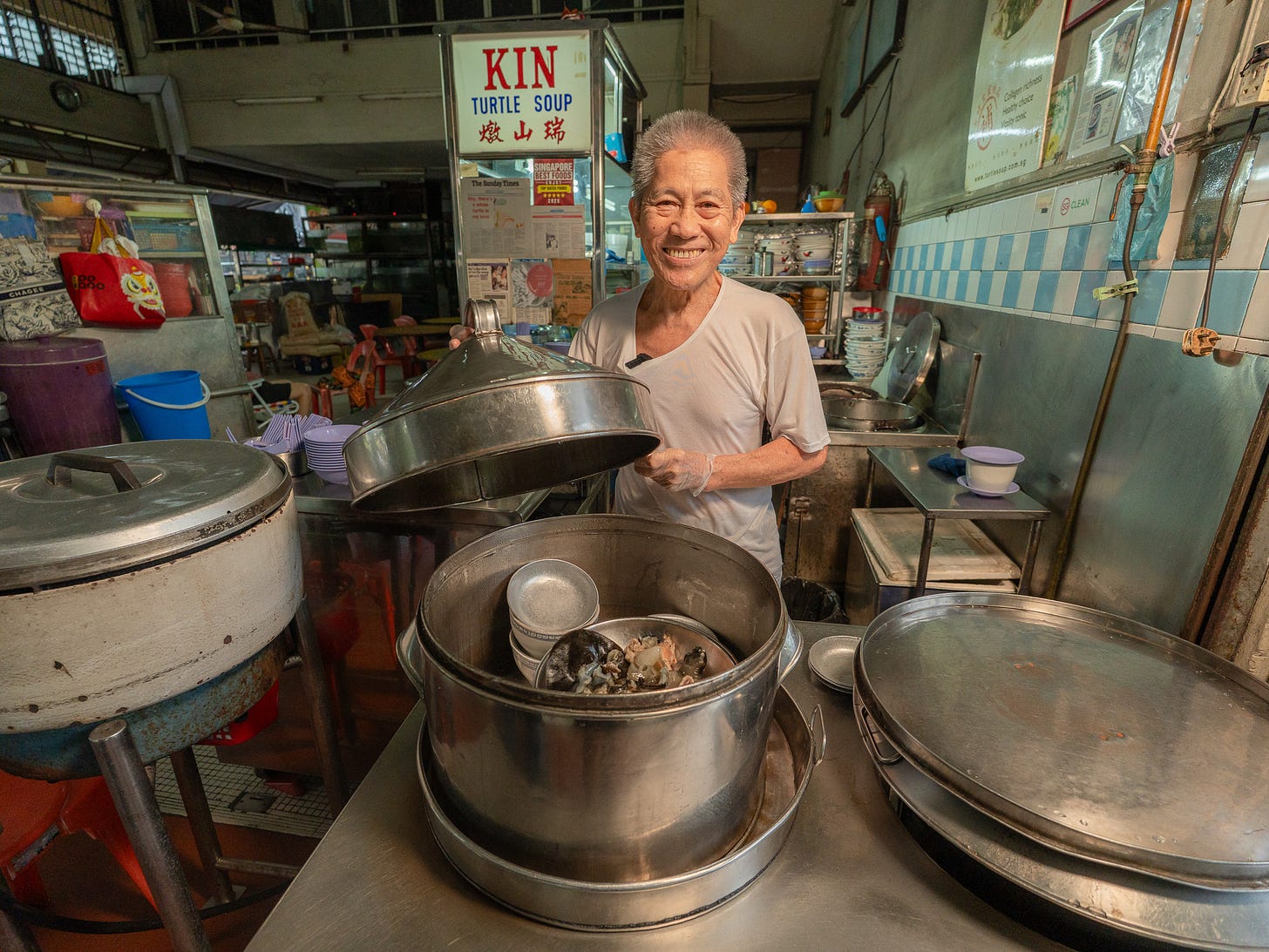 Uncle Phoon with his pot of turtle meat