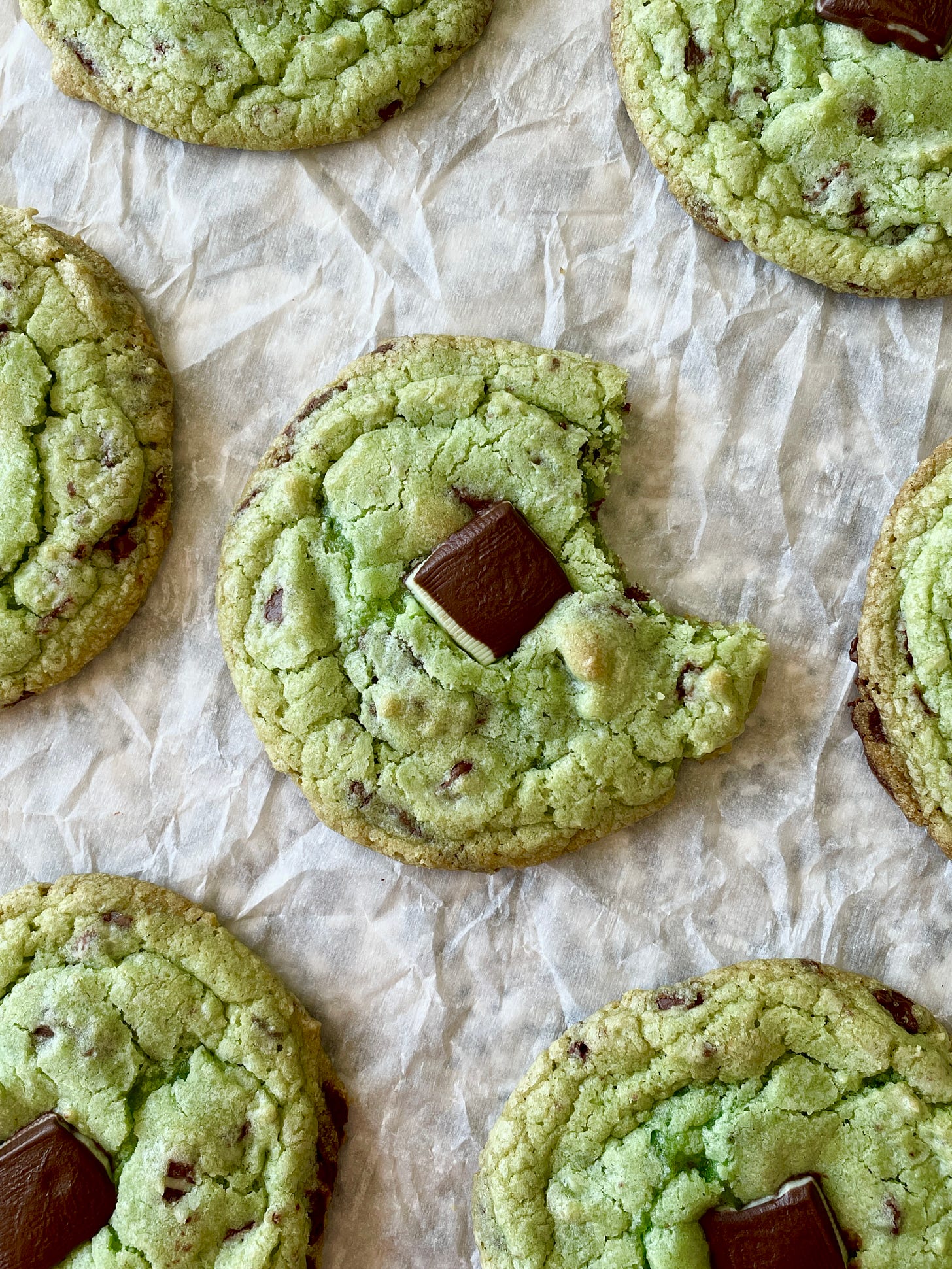 top view of mint chocolate chip cookie with bite mark