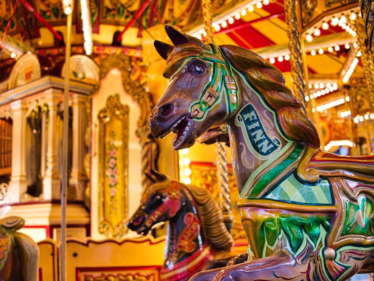 Horses on a merry go around