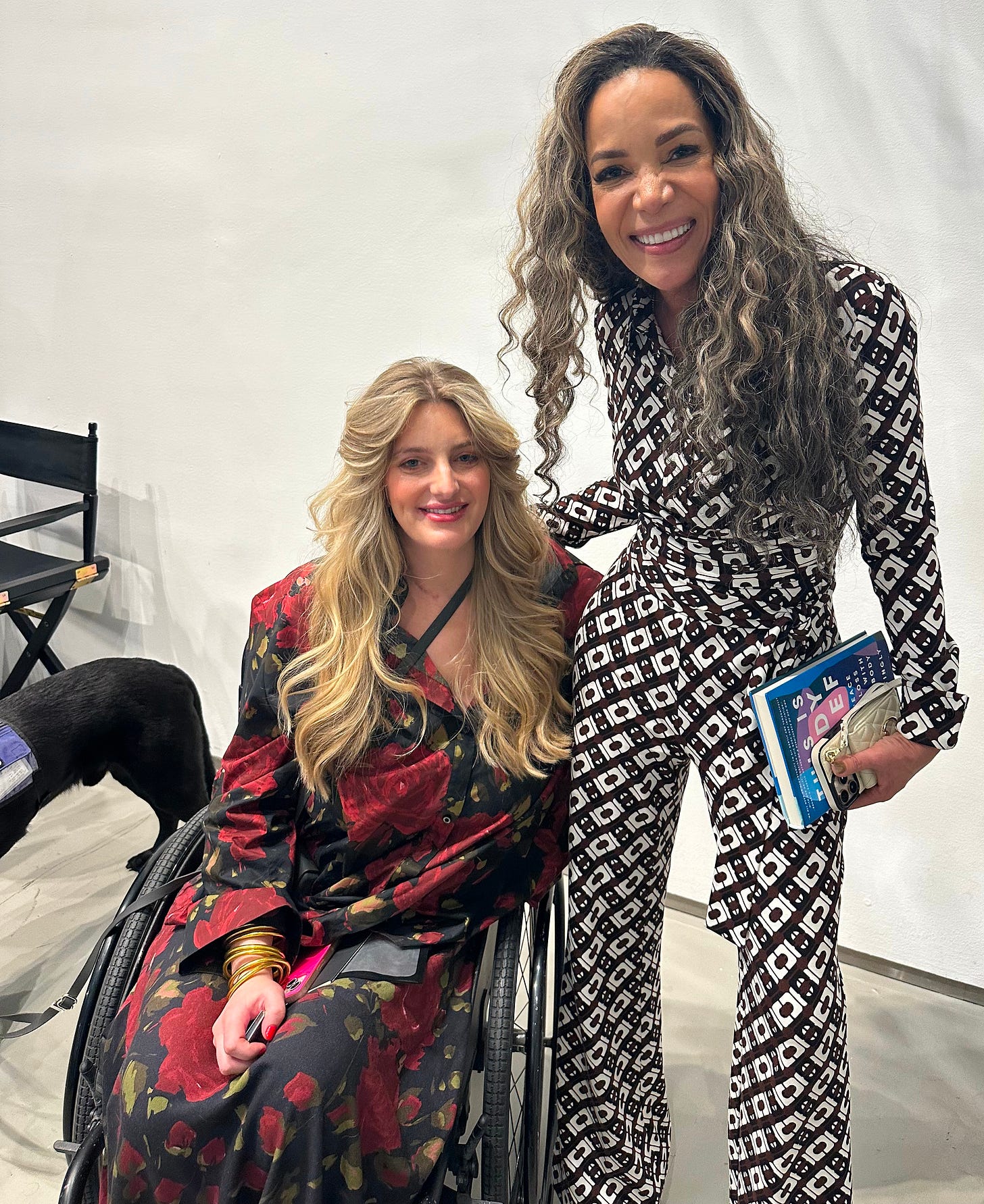 Jayne Mattingly and Sunny Hostin posting for a photo while sunny holds THIS IS BODY GRIEF by Jayne Mattingly 