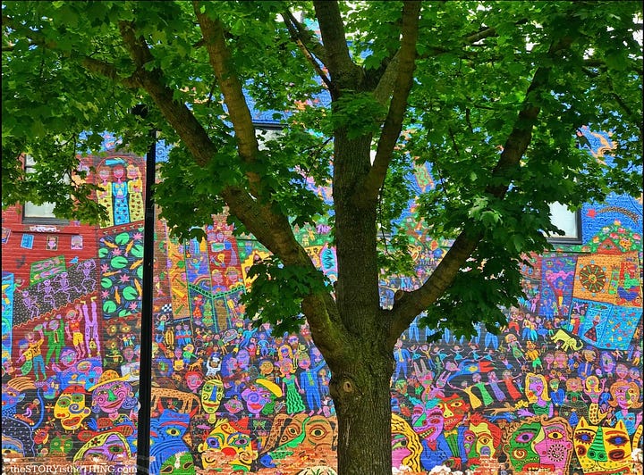 Four images of the vibrant 'Wonder Mural' by artist Charles Jupiter Hamilton in Charleston, W.Va.