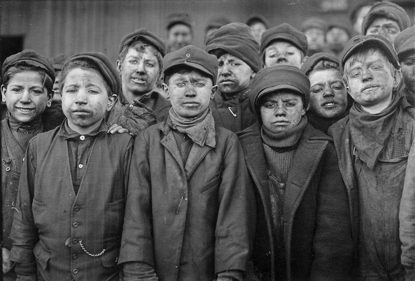 A group of children in a row

AI-generated content may be incorrect.
