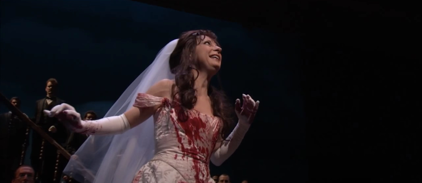 Madness with an audience: Natalie Dessay in the mad scene from Donizetti’s Lucia di Lammermoor at the Metropolitan Opera (screenshot) Madness with an audience: Natalie Dessay in the mad scene from Donizetti’s Lucia di Lammermoor at the Metropolitan Opera (screenshot)
