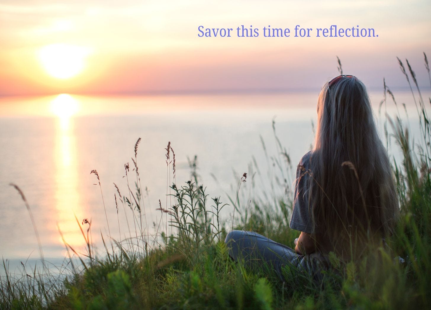 A Canva photo of a woman looking over the lake at the sun with the words, "Savor this time of reflection," added.