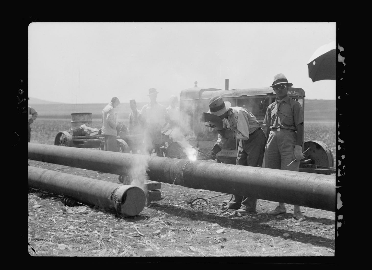 Workers welding the Iraq Petroleum Company pipeline across the Plain of Esdraelon in July 1933. American Colony Photo Department, Library of Congress LC-DIG-matpc-15775. Workers welding the Iraq Petroleum Company pipeline across the Plain of Esdraelon in July 1933. American Colony Photo Department, Library of Congress LC-DIG-matpc-15775.
