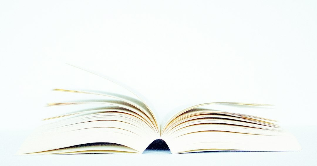 white book page on black surface