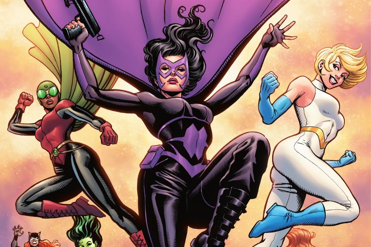 Huntress with Power Girl and Dr Mid-Nite in the background in JSA International Women's Day cover.