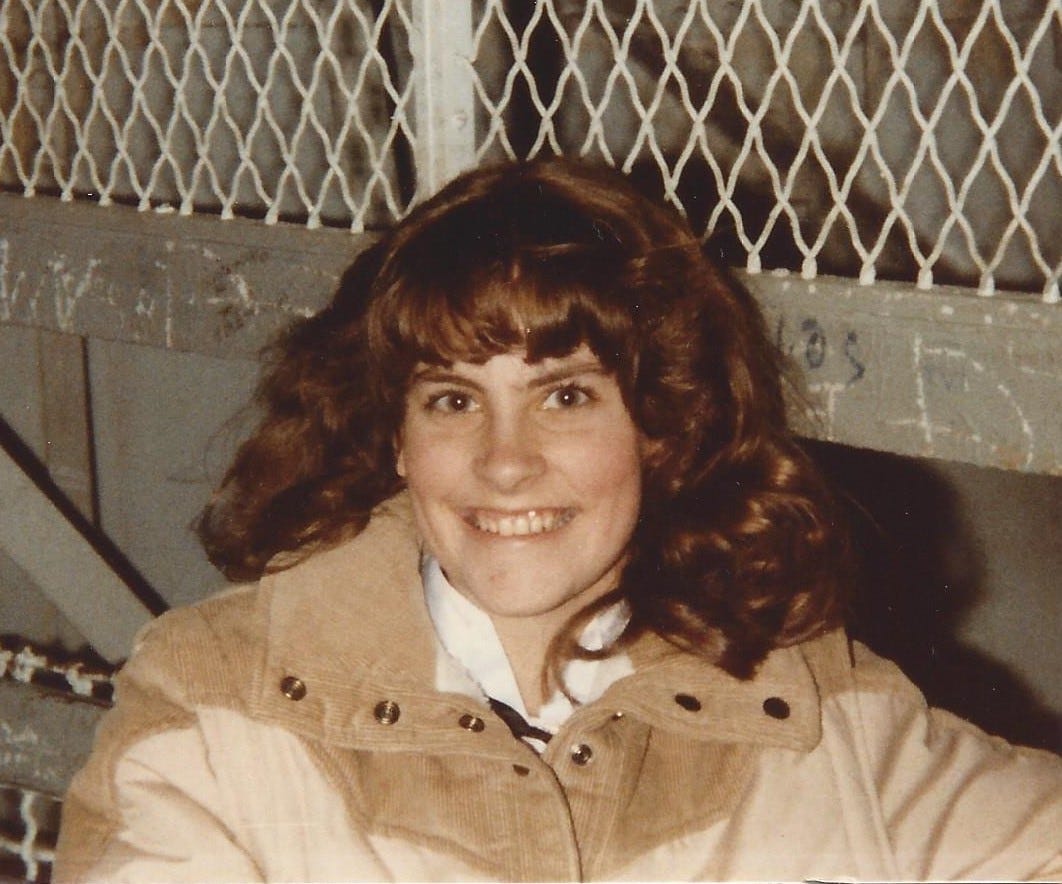 High school aged girl looks eagerly at the camera High school aged girl looks eagerly at the camera
