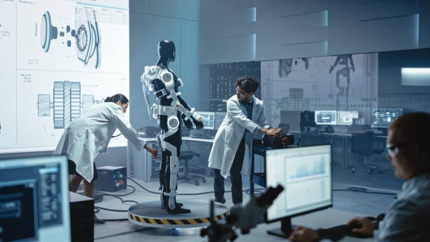 In Robotics Development Laboratory: Chief Female Engineer and Top Male Scientist Work on a Bionics Exoskeleton Prototype. Designing Powered Exosuit to Help Disabled People, Hard Labor Workers In Robotics Development Laboratory: Chief Female Engineer and Top Male Scientist Work on a Bionics Exoskeleton Prototype. Designing Powered Exosuit to Help Disabled People, Hard Labor Workers AI and robotics healthcare stock pictures, royalty-free photos & images