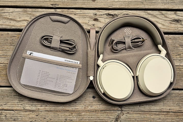 Sennheiser Momentum 5 Wireless travel case seen open and closed.