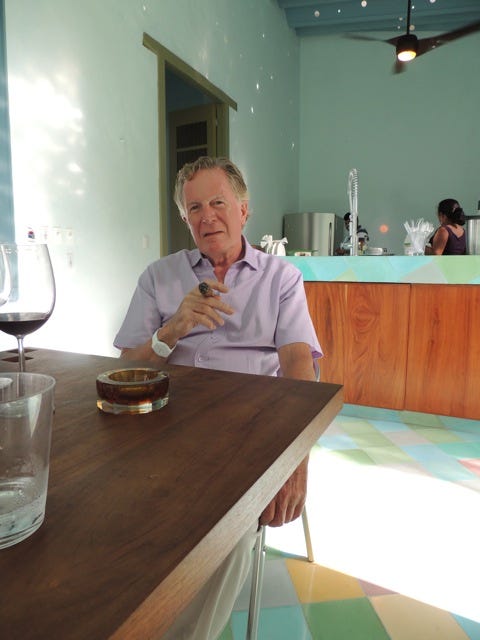 A person sitting at a table

Description automatically generated