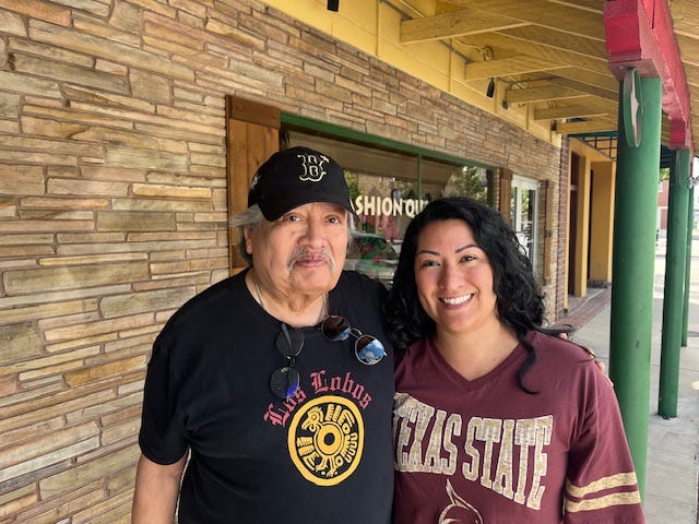 A photo featuring Sonia Arellano and her mentor Jaime Mejia, smiling and looking at the camera. Sonia wears a Texas State t-shirt.