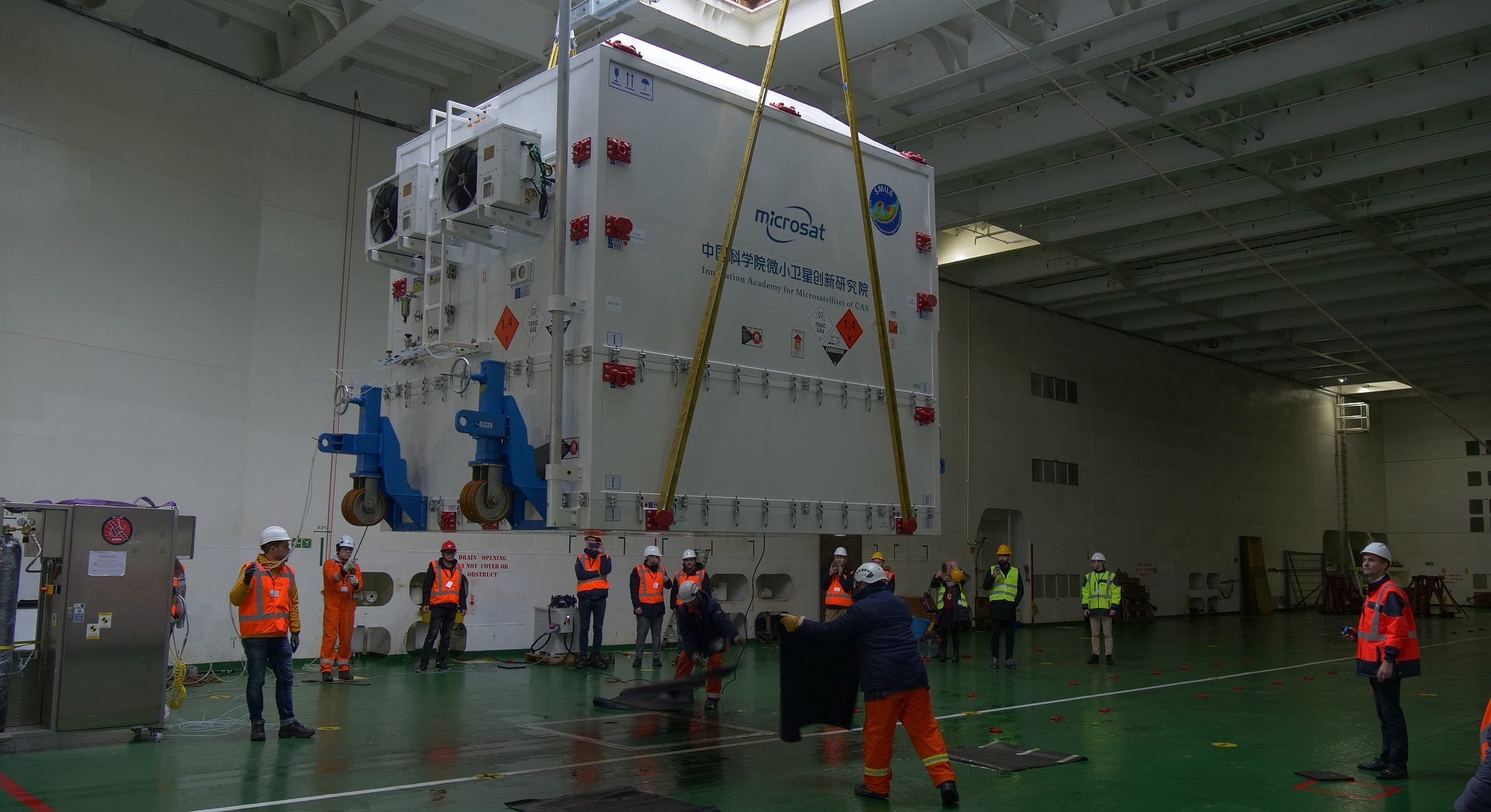 SMILE inside of its transportation container being loaded onto the cargo ship MN Colibri at the Port of Amsterdam on February 11th. SMILE inside of its transportation container being loaded onto the cargo ship MN Colibri at the Port of Amsterdam on February 11th.