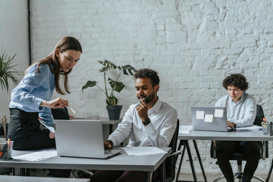 Photo by olia danilevich - coworkers sharing ideas at work
