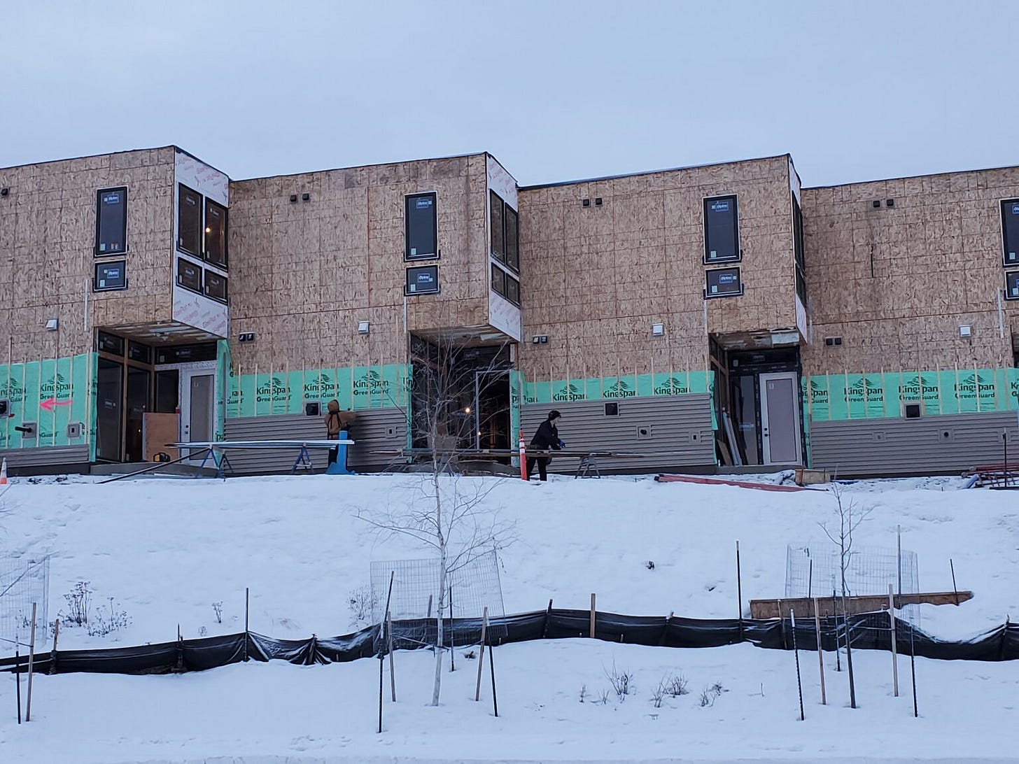Construction workers are seen at a housing site in downtown Anchorage on Dec. 17. 2024. (Photo by Yereth Rosen/Alaska Beacon) Construction workers are seen at a housing site in downtown Anchorage on Dec. 17. 2024. (Photo by Yereth Rosen/Alaska Beacon)